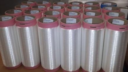 Synthesefaserfilamente mit tribologisch verbesserten Eigenschaften (Hybridgarn) Synthesefaserfilamente mit tribologisch verbesserten Eigenschaften (Hybridgarn)